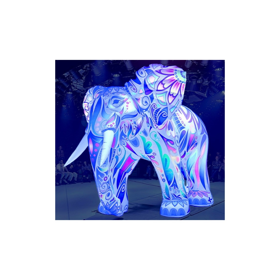 A colourful illuminated elephant sculpture