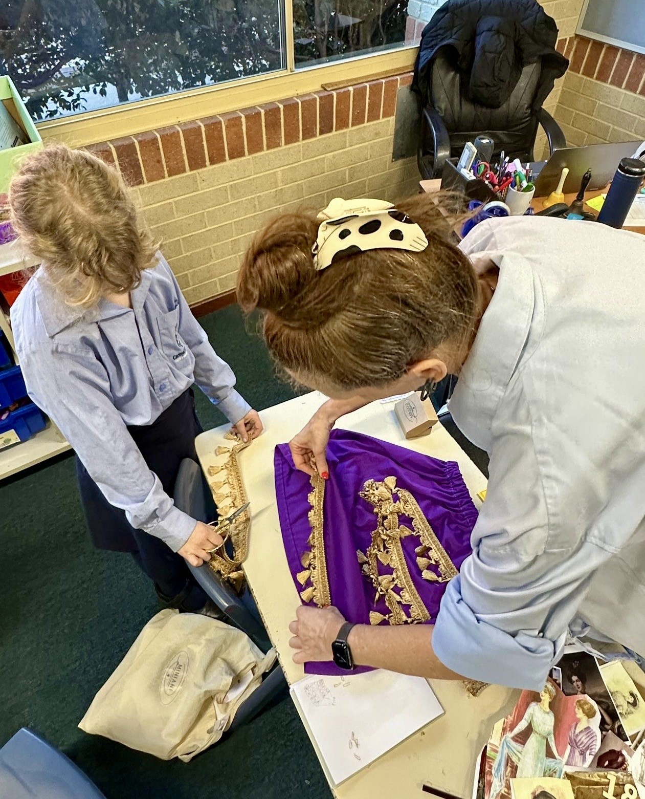 Young makers working together on a sewing project